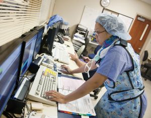 Nurse in Xray protective clothing